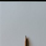 brown pencil on white surface
